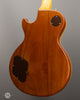 Gibson Electric Guitars - 1975 Les Paul Deluxe - Gold Top - Used - Back Angle 